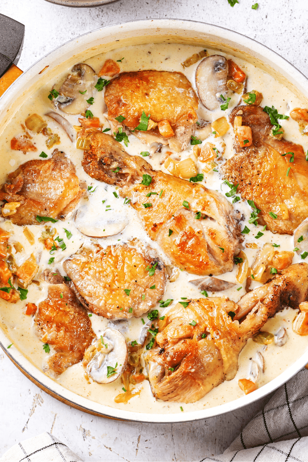 A pot filled with chicken fricassee.