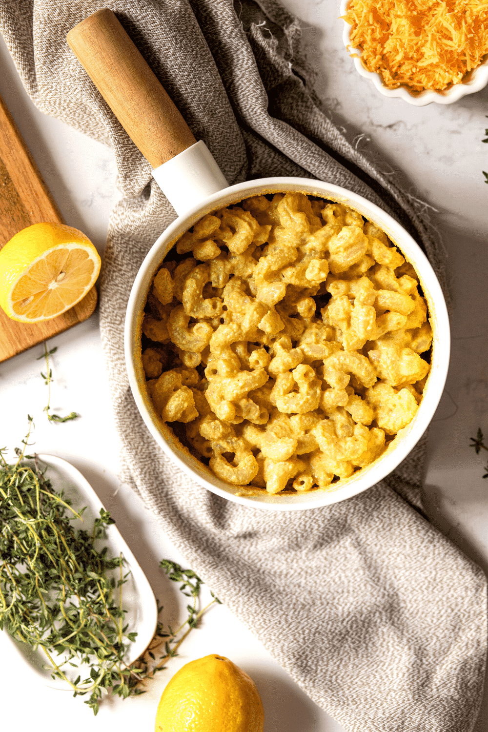 A white bowl filled with vegan Mac and cheese.