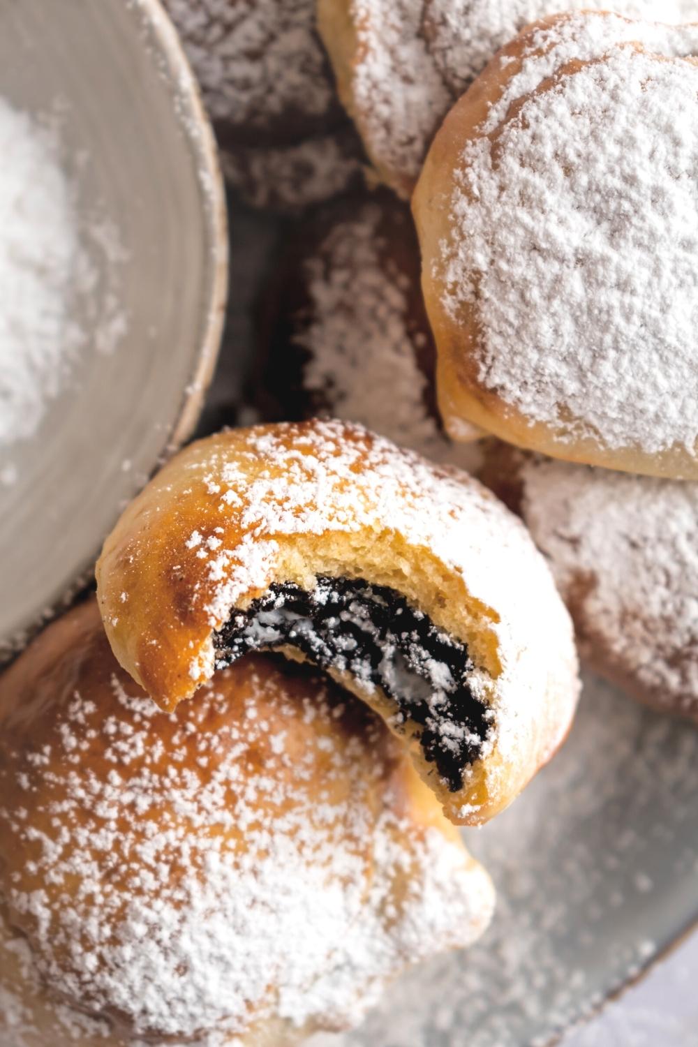 Air fryer fried Oreo with a bite out of the front of it.