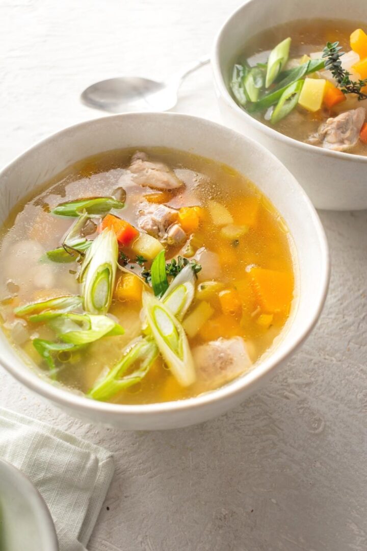 Jamaican Chicken Soup Made With Dumplings & Fresh Ingredients