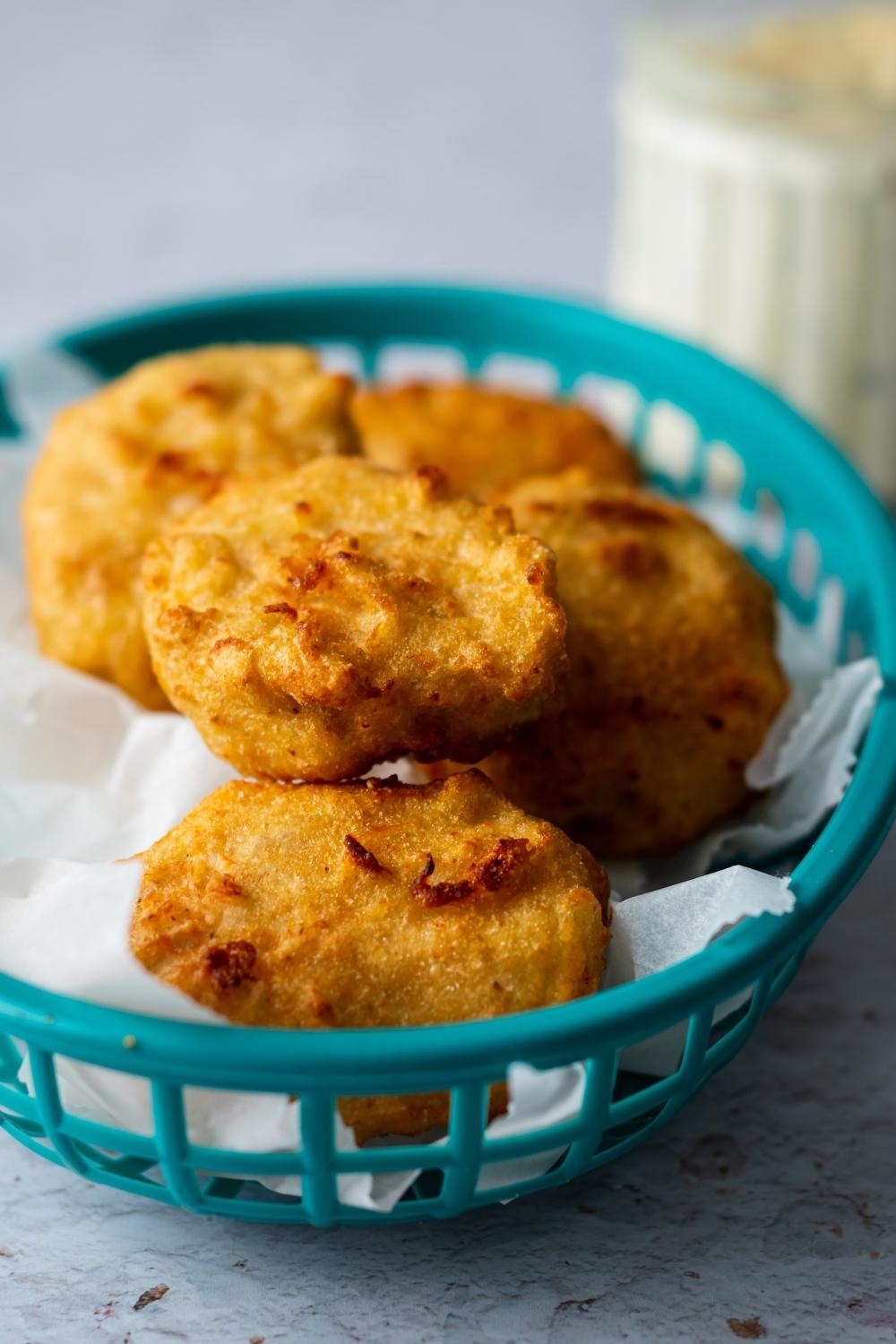 A basket of homemade chicken McNuggets.