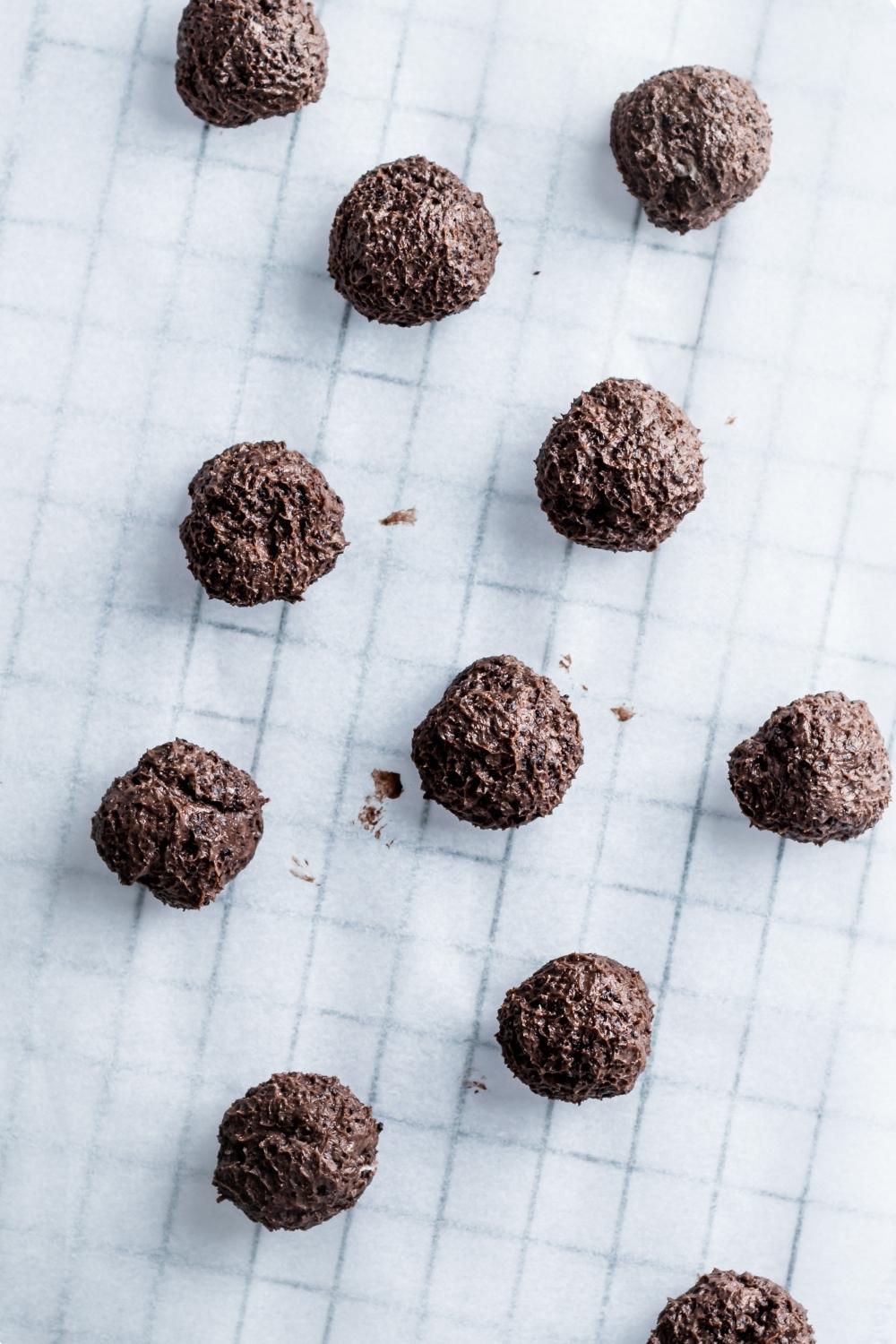 An overhead view of oreo balls not covered in white chocolate.