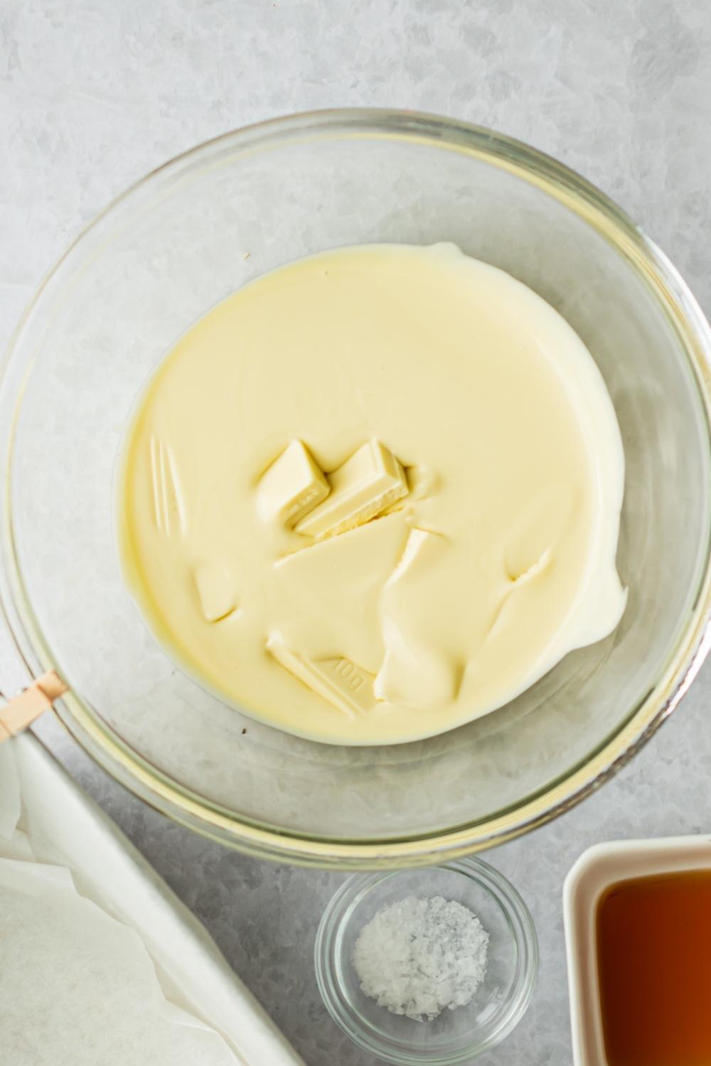 A medium bowl with melted white chocolate.