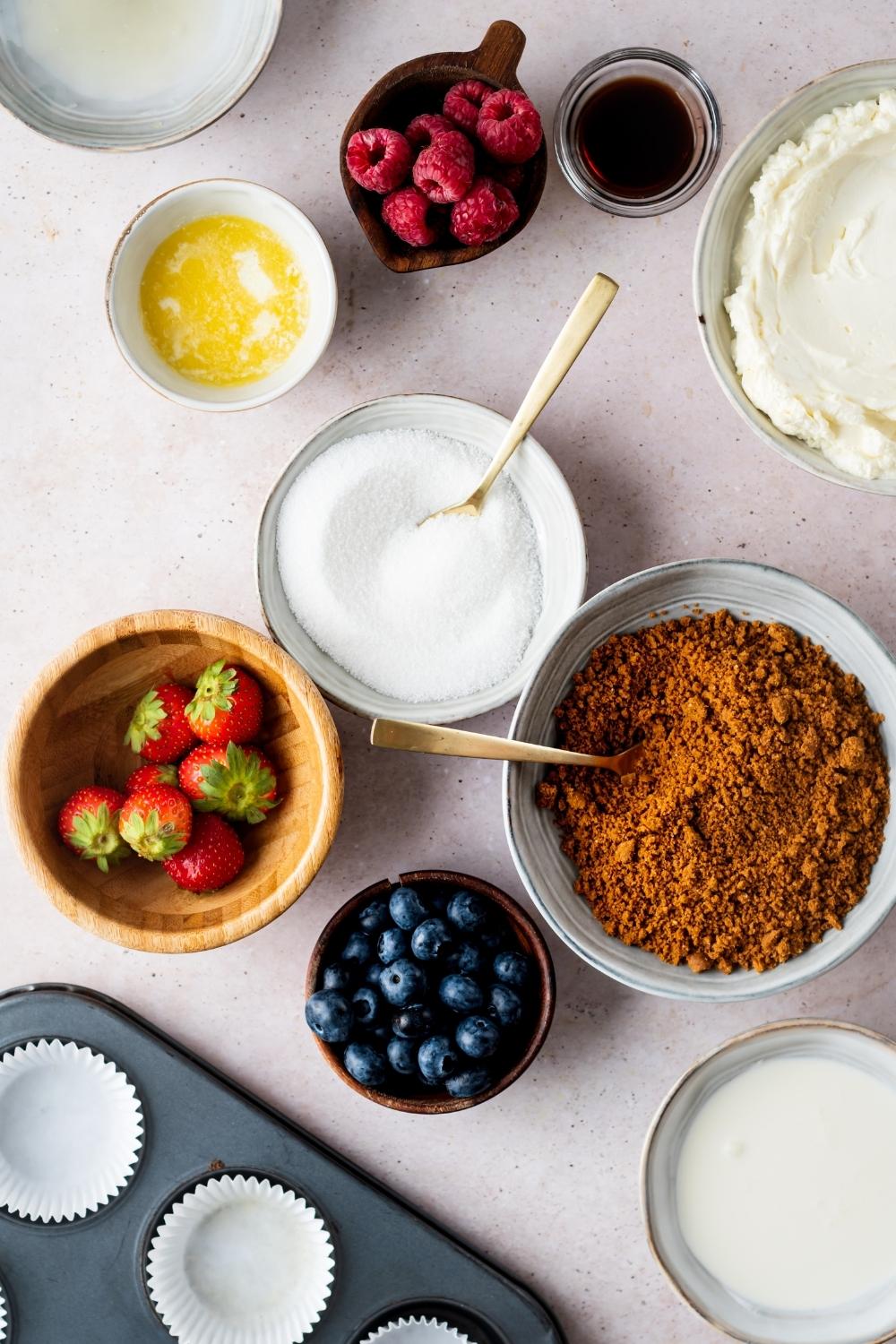 An overhead view of the ingredients to make homemade cheesecake bites.