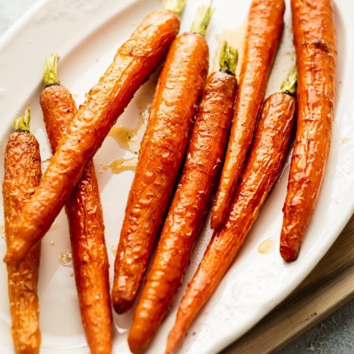 candied carrots on a white plate