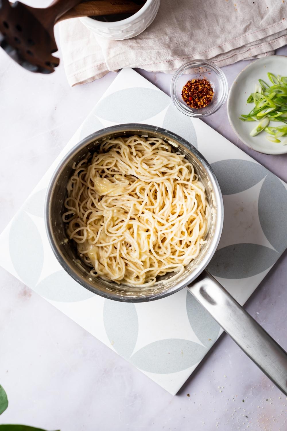 cheesy ramen in a pot