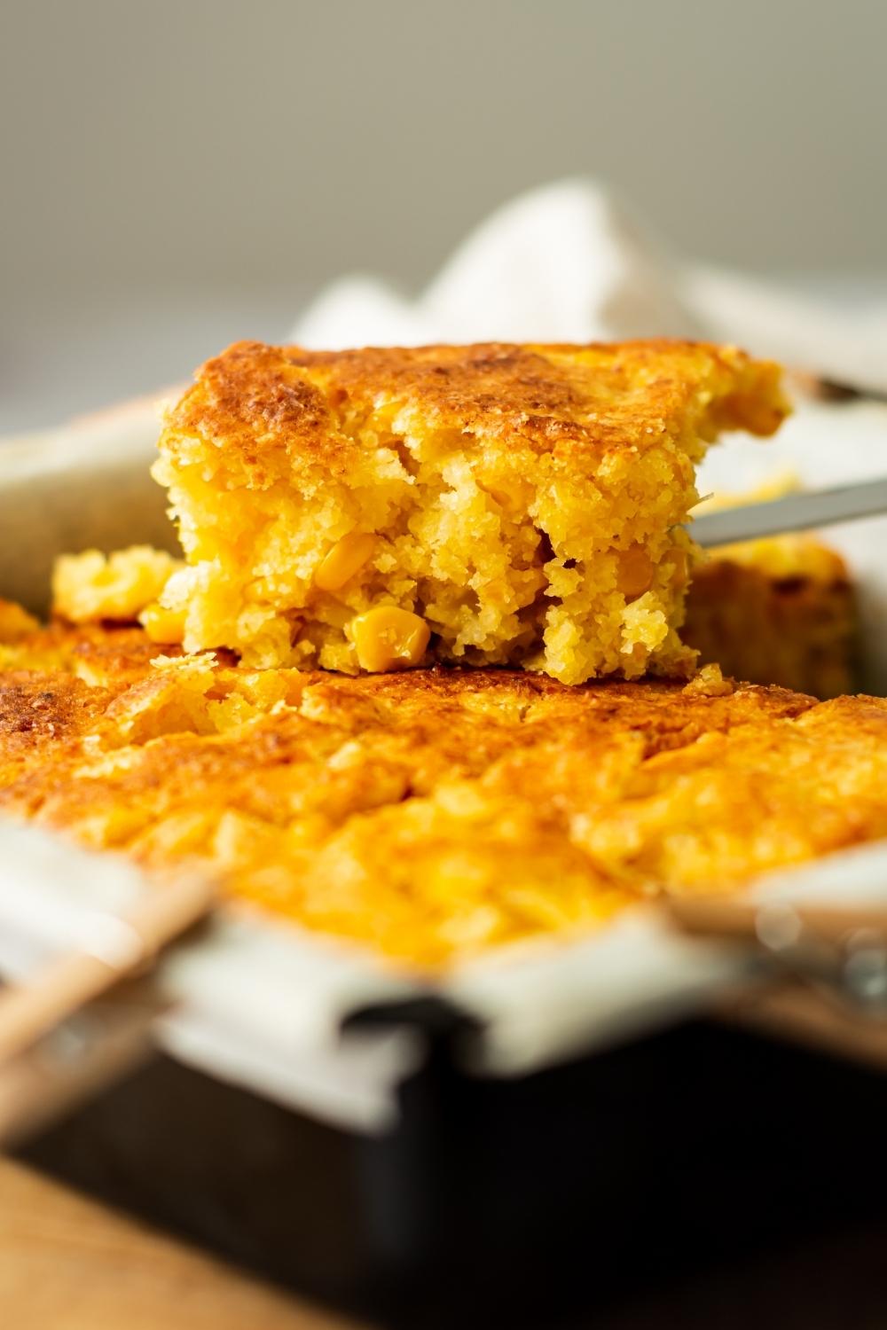 A square of sweet corn cake.