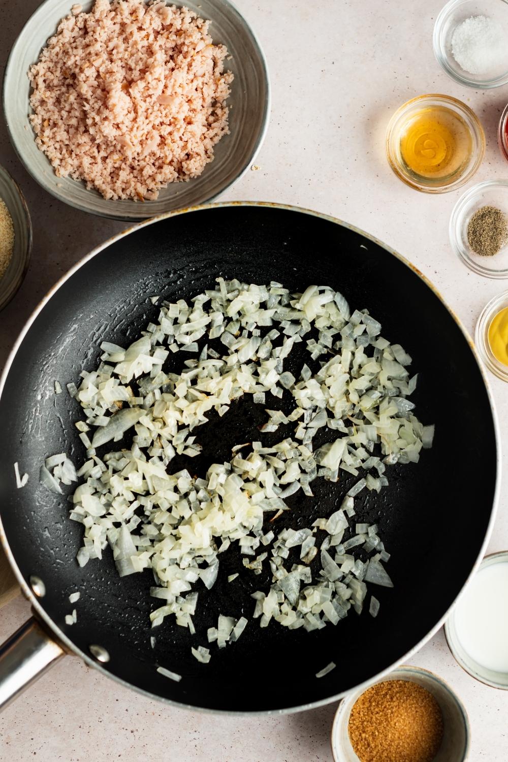 onions cooking in a pan