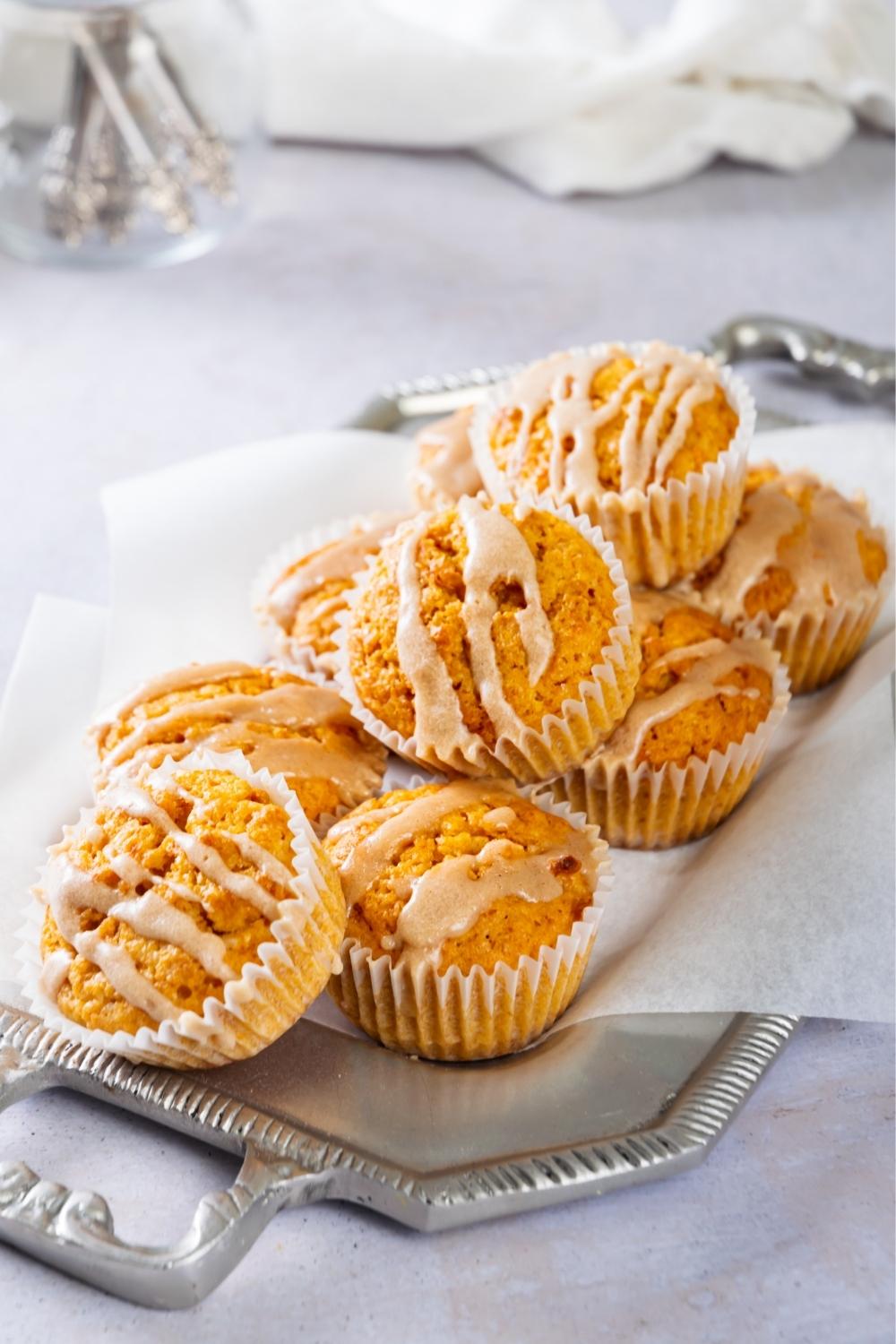 A bunch of sweet potato muffins on a tray.