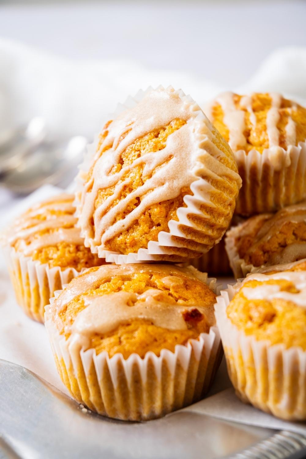 A bunch of sweet potato muffins on top of each other.