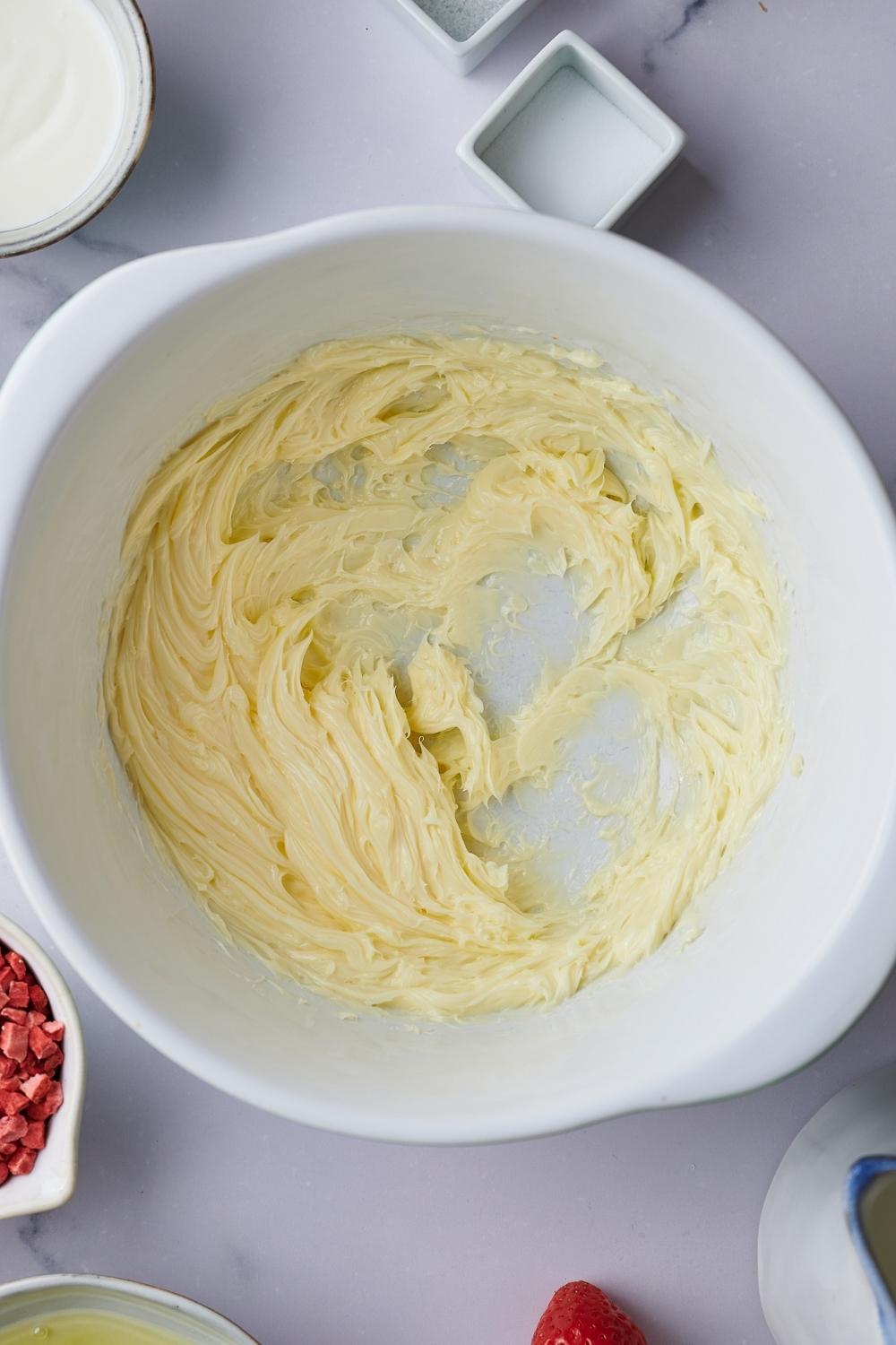 A mixing bowl of creamed butter.