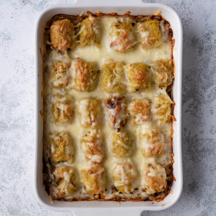 Cowboy casserole in a white baking dish.