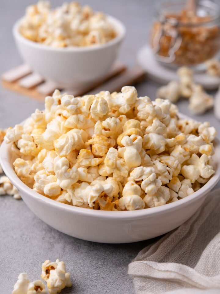 A bowl with popped kettle corn piled high.