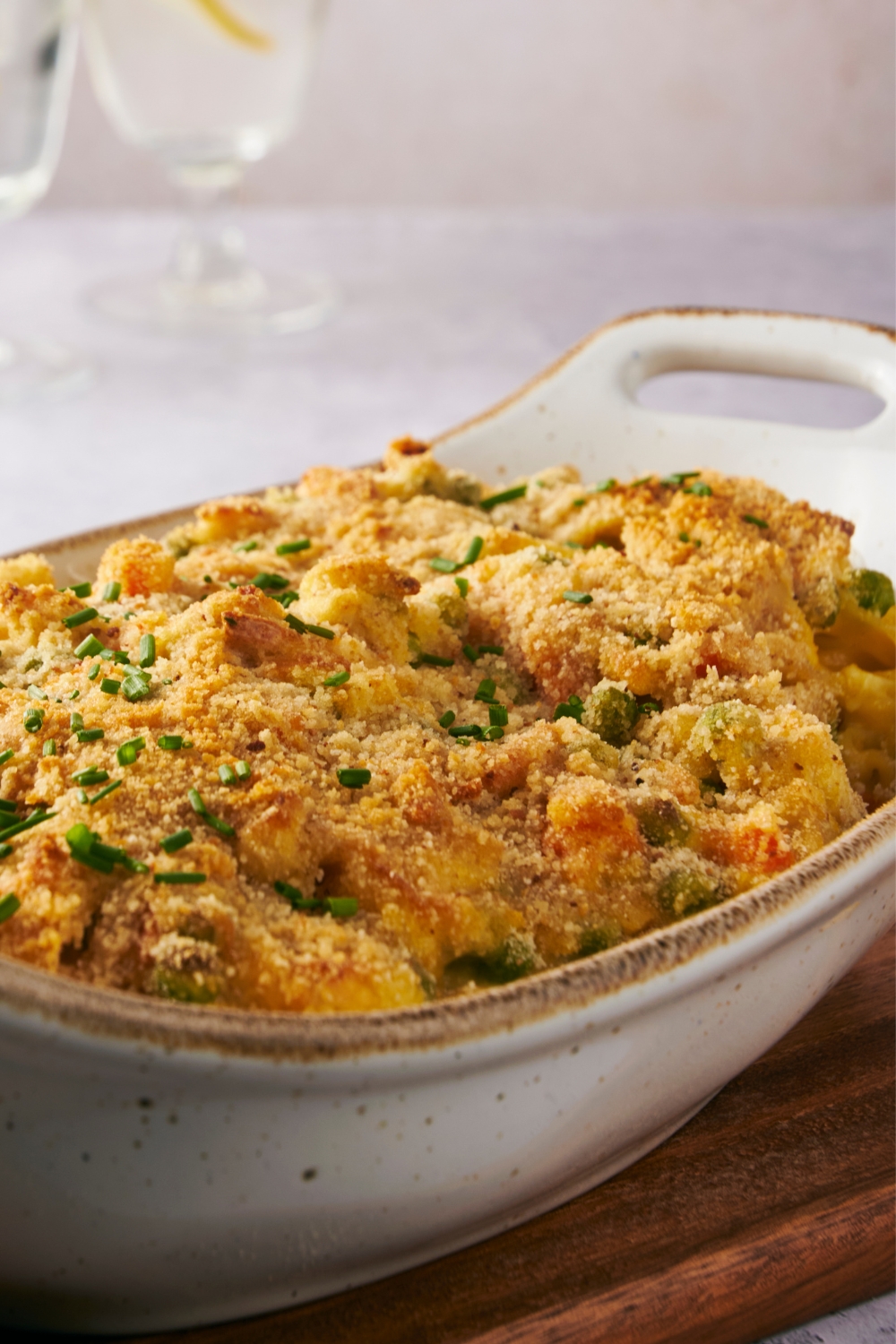 A casserole dish with chicken noodle casserole in it.