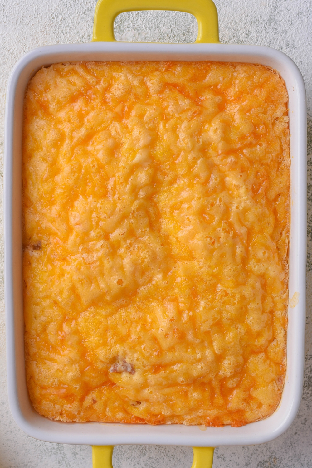 A casserole dish with cooked breakfast casserole.