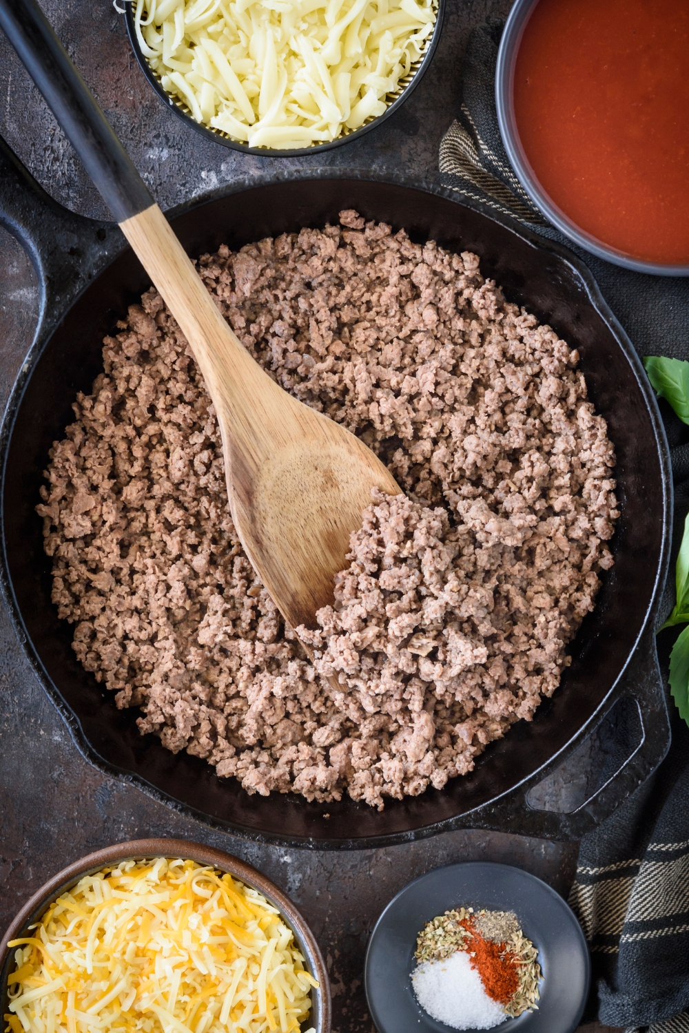 Cooked ground beef in a skillet.