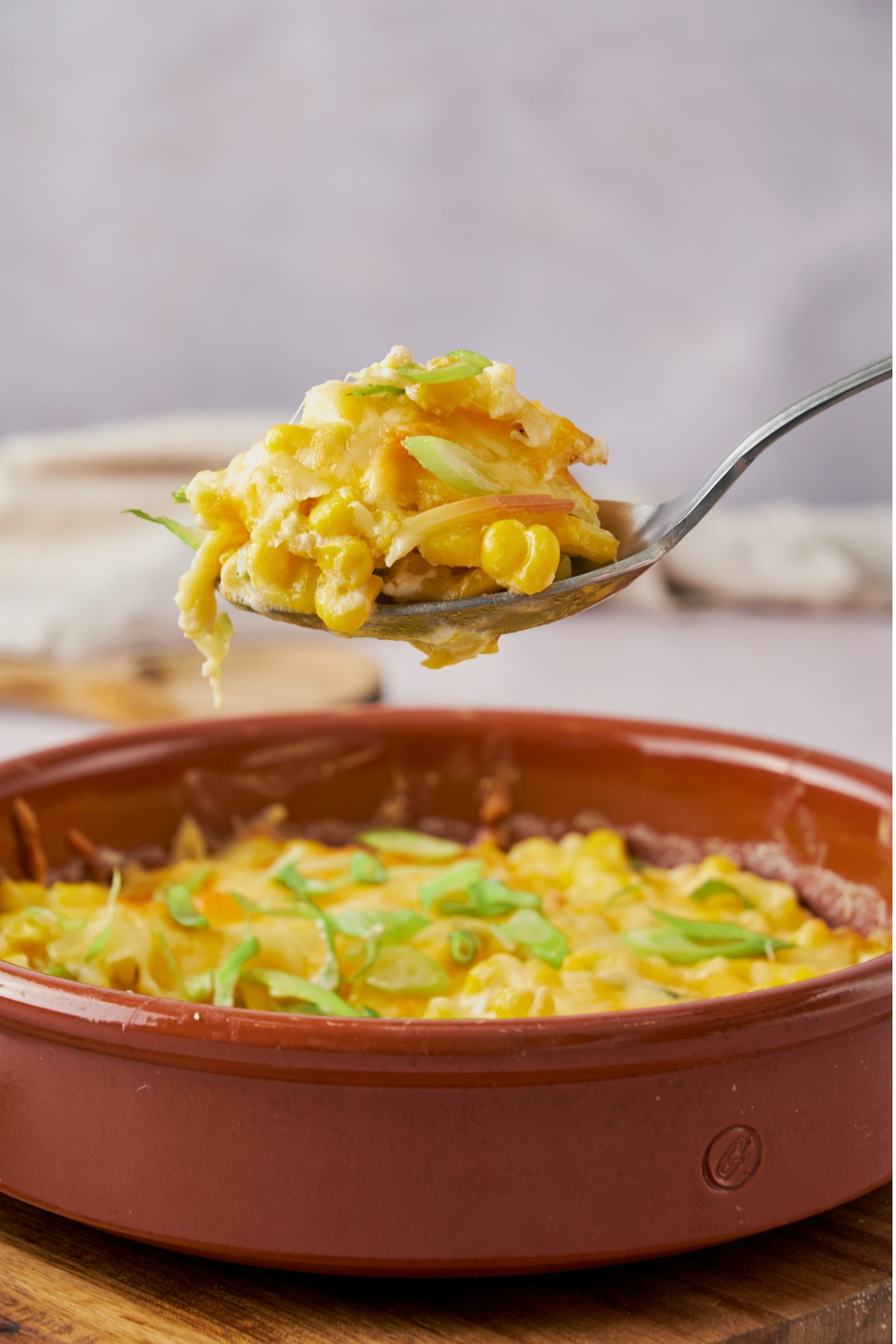 A spoonful of cooked jalapeno corn casserole