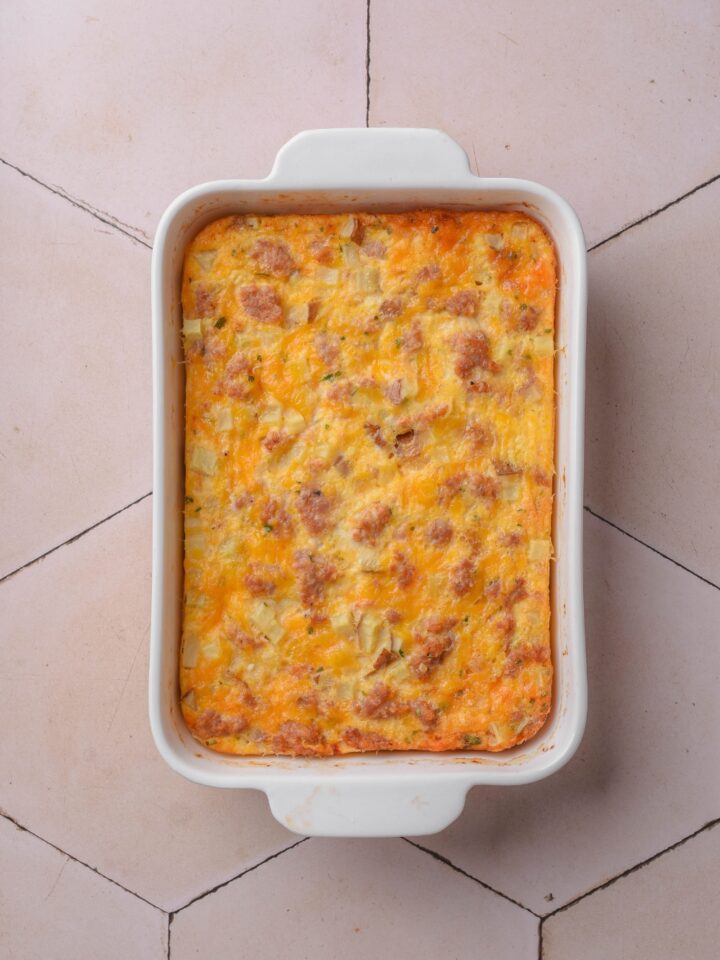 A casserole dish with baked hash brown casserole.
