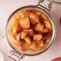 A mason jar with apple compote.