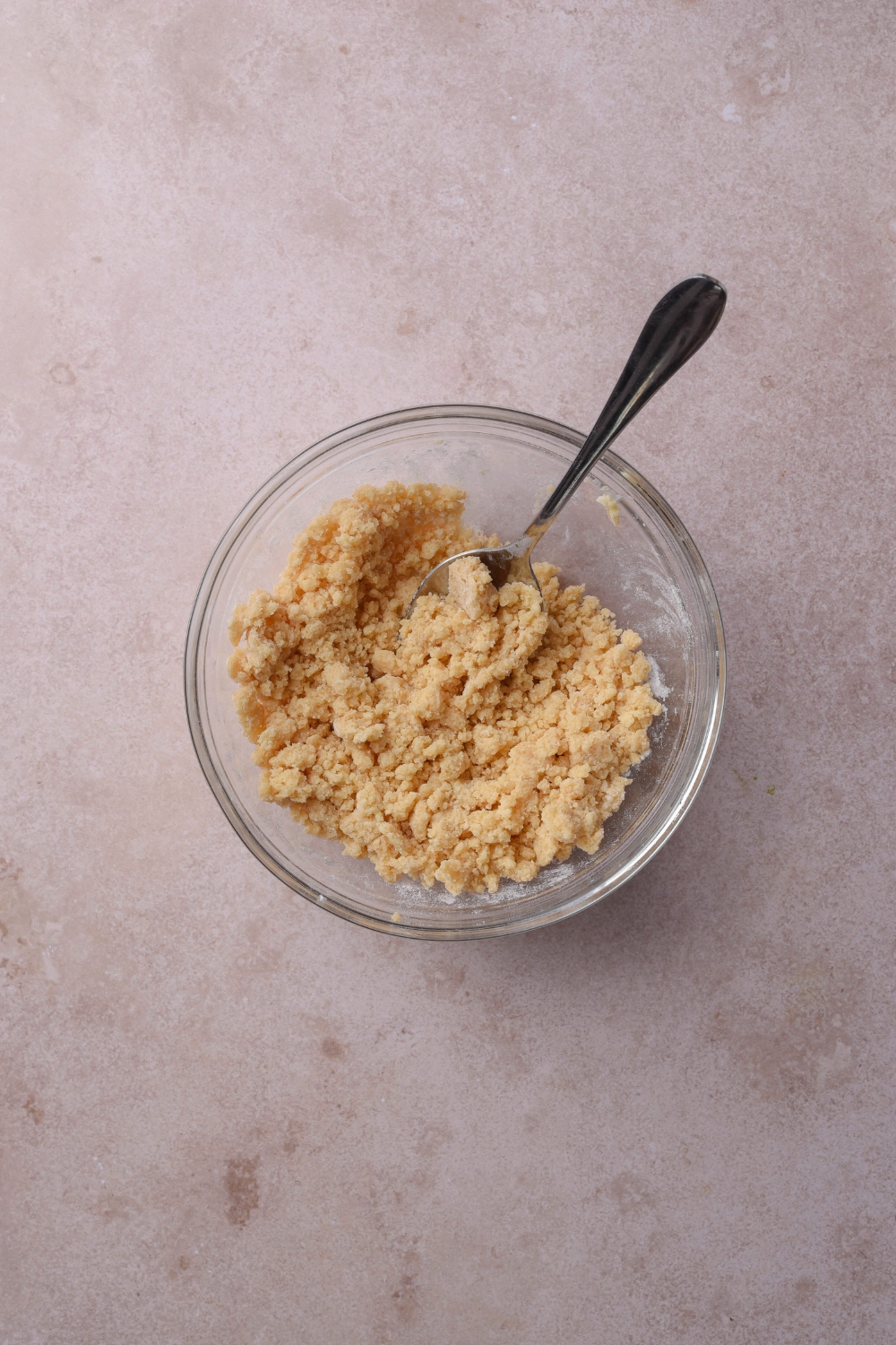 A small bowl with the streusel crumble.