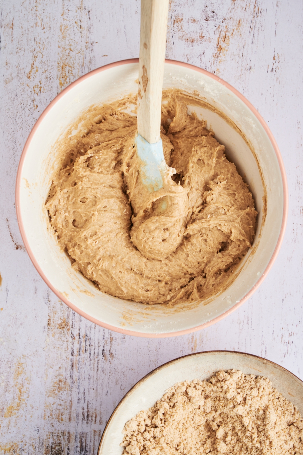 A mixing bowl with muffin batter.