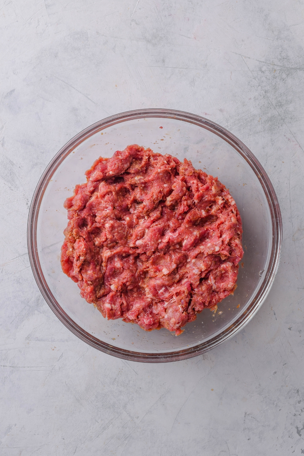 A mixing bowl with the ground beef mxture.