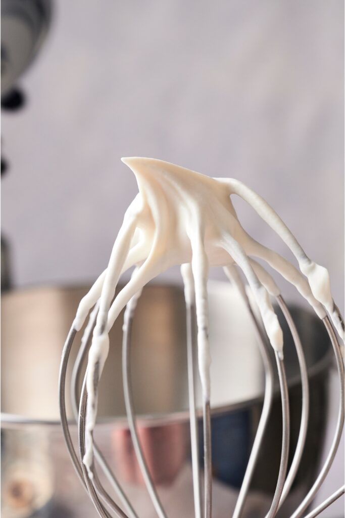 A step-by-step guide on creating a creamy, homemade crème fraîche frosting base.