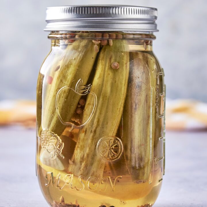 A jar with pickled okra.