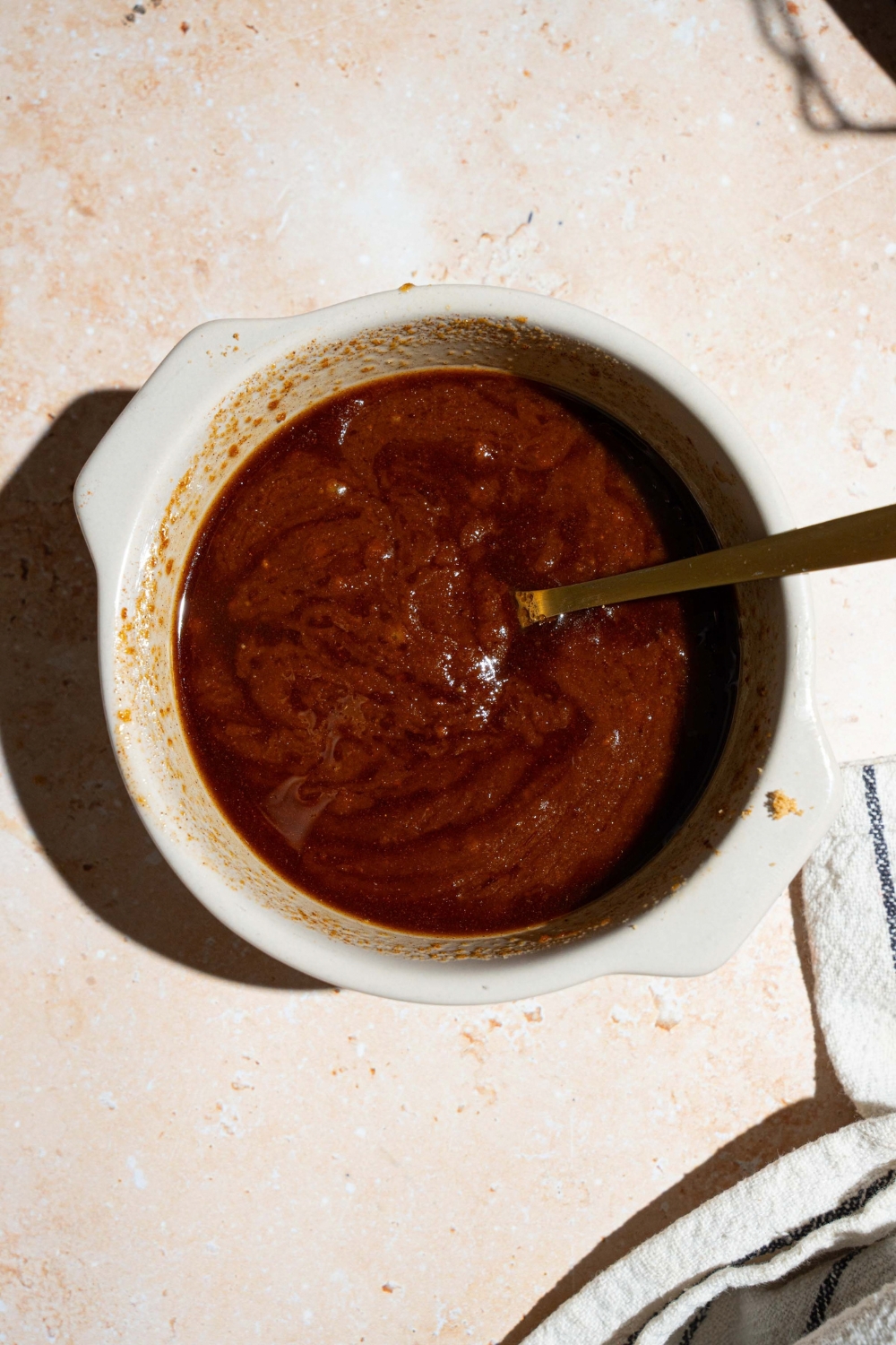 A bowl of a brown sugar cinnamon mixture.