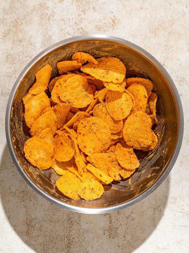 A bunch of creamy Peri peri lays in a metal bowl.