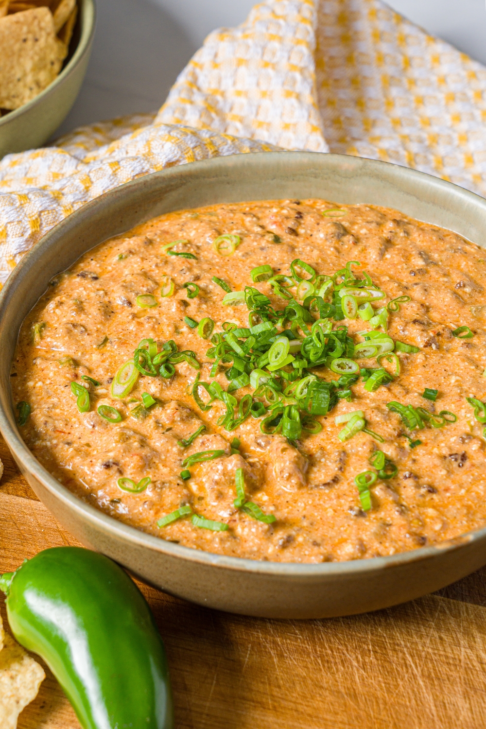 A bowl with high protein taco dip in it.
