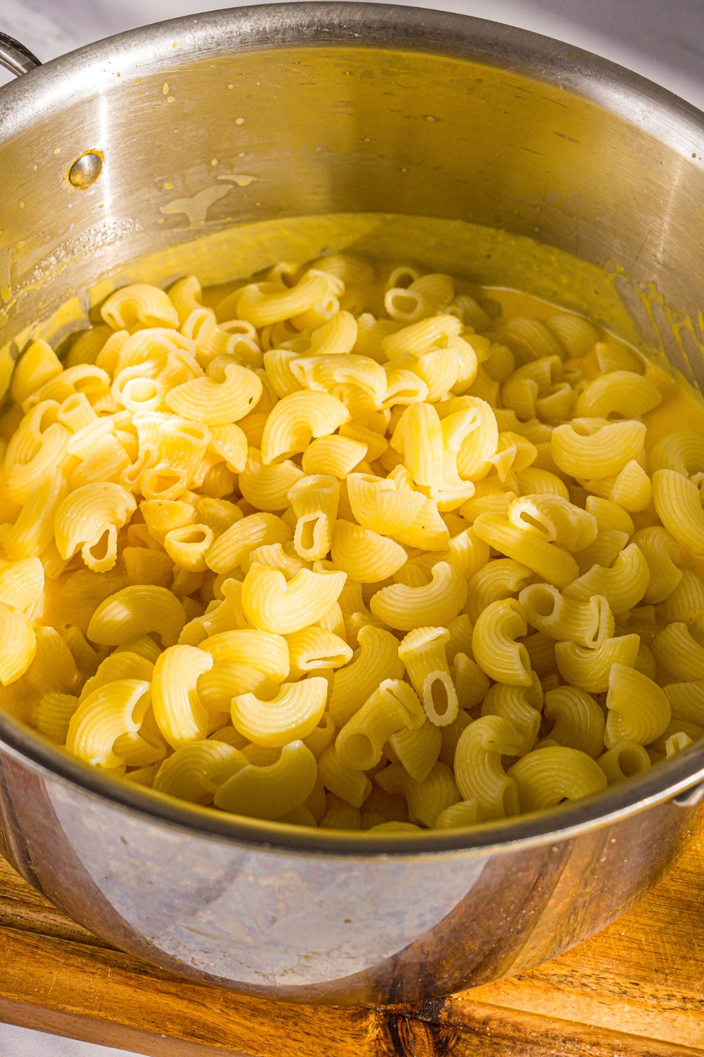 Trader Joe's Italian macaroni cooked in a pot of water.